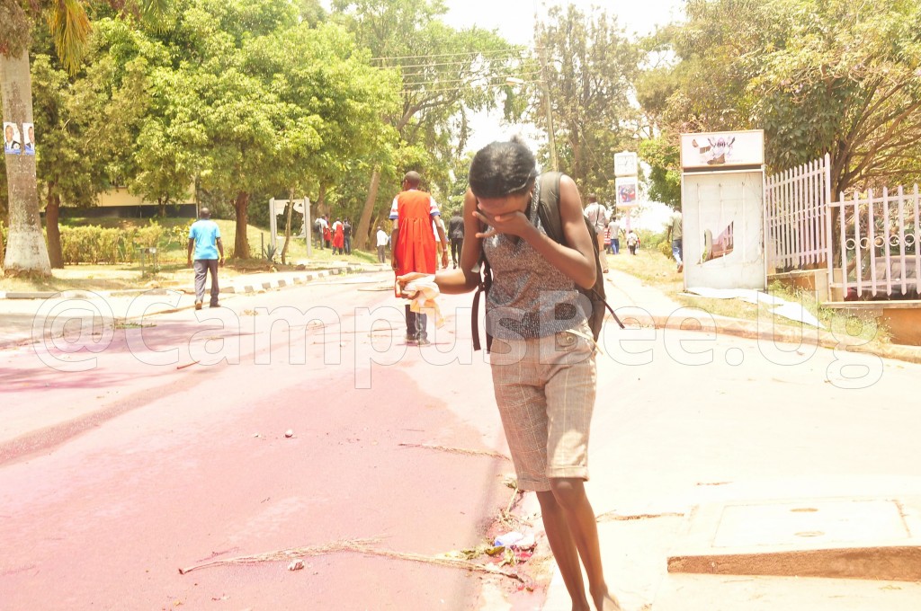Makerere student gasps for breath after police fired teargas