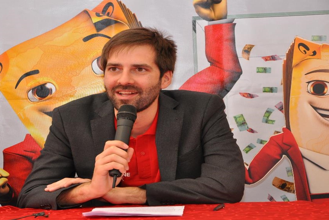 Airtel Money Director Mr. Paul Langlois addressing journalists during the launch