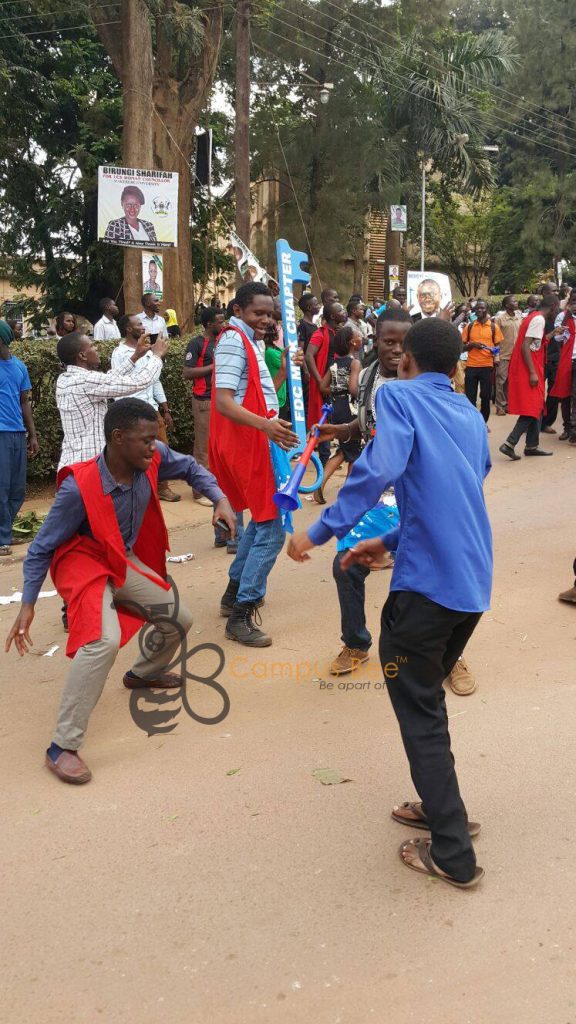 FDC fans from MUK dancing as they wait for Dr. Kizza Besigye