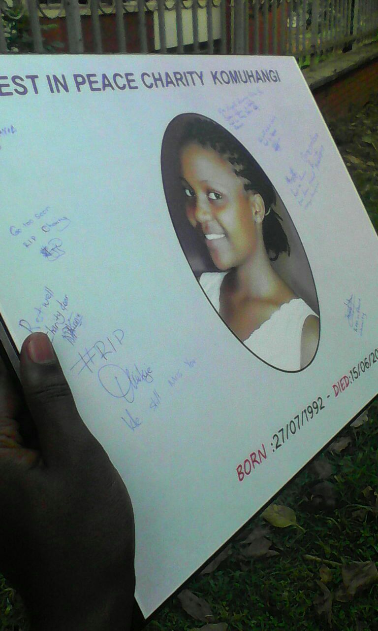 Friends sign their names against her photo