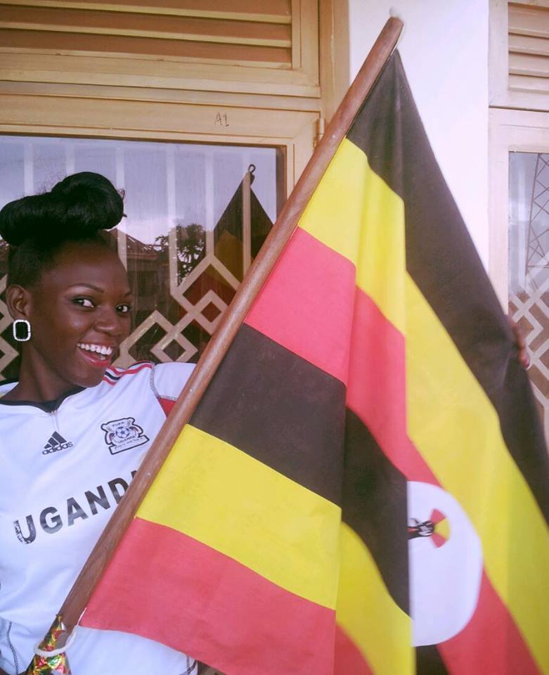 Leah Kalanguka waving the National flag is her celebratory stunt