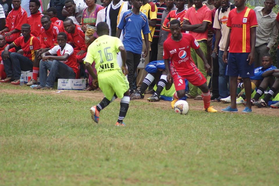 Munubi [in Red]  from MUK who won the man of the match game dribbling