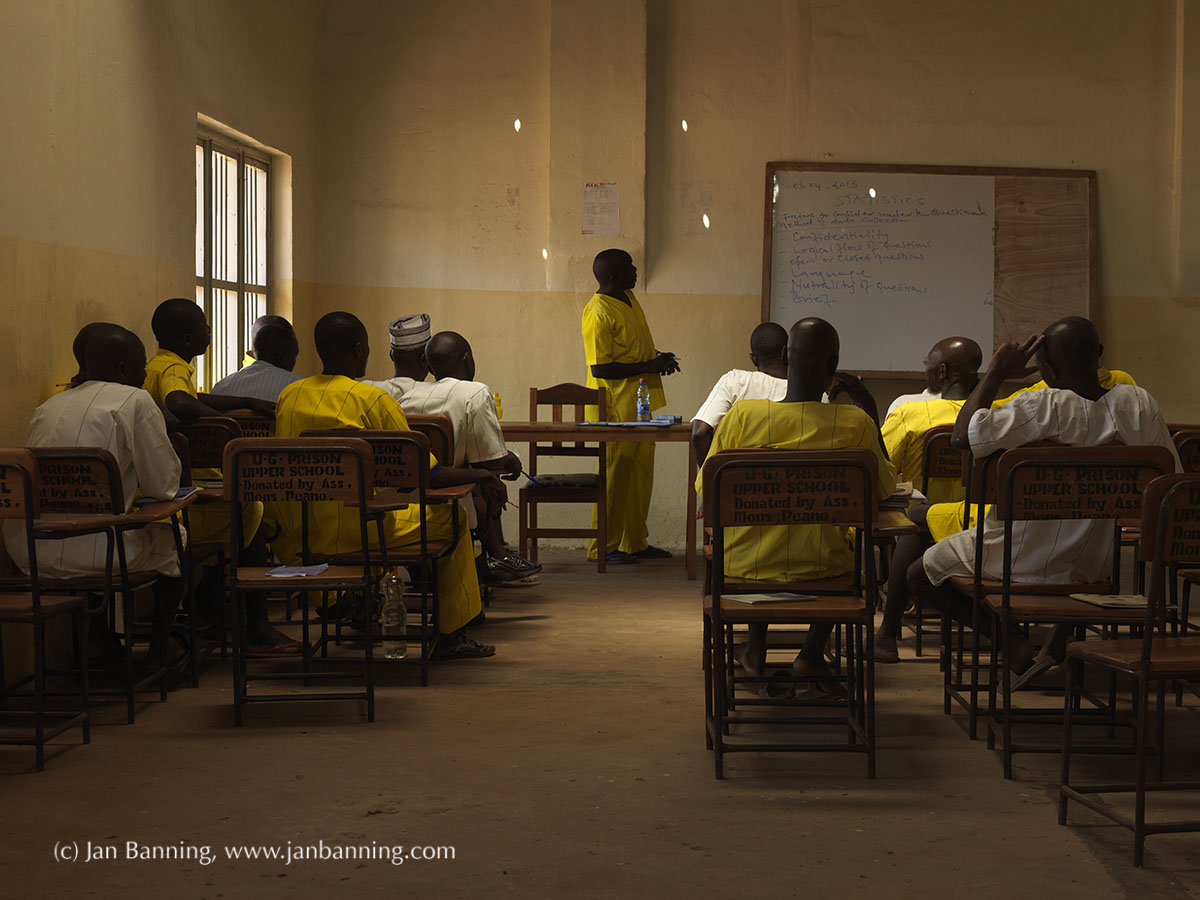 Law and Order, Uganda, 2013. Luzira Upper Prison in Kampala, Uganda's biggest max security prison. University level eduaction in prison: Business Statistics, part of study Small Business Management (4 semesters). The men in white are on Death Row.
