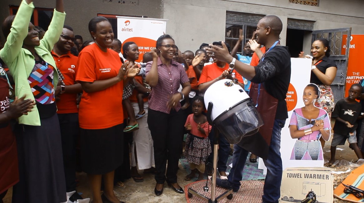 Airtel Uganda employees led by HR Director Ms. Flavia Ntambi hand over hair driers and other tools to Pelletier Teenage Mothers foundation