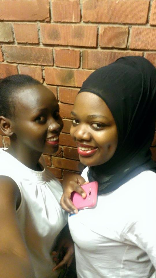 Ahumuza Shamsa (in hijab) with a friend