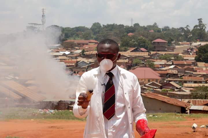 Samuel Mugarura demonstrates his smoke bomb