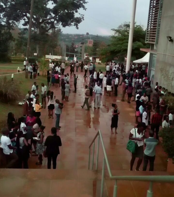 Students standing outside the evacuated Ham Mukasa library