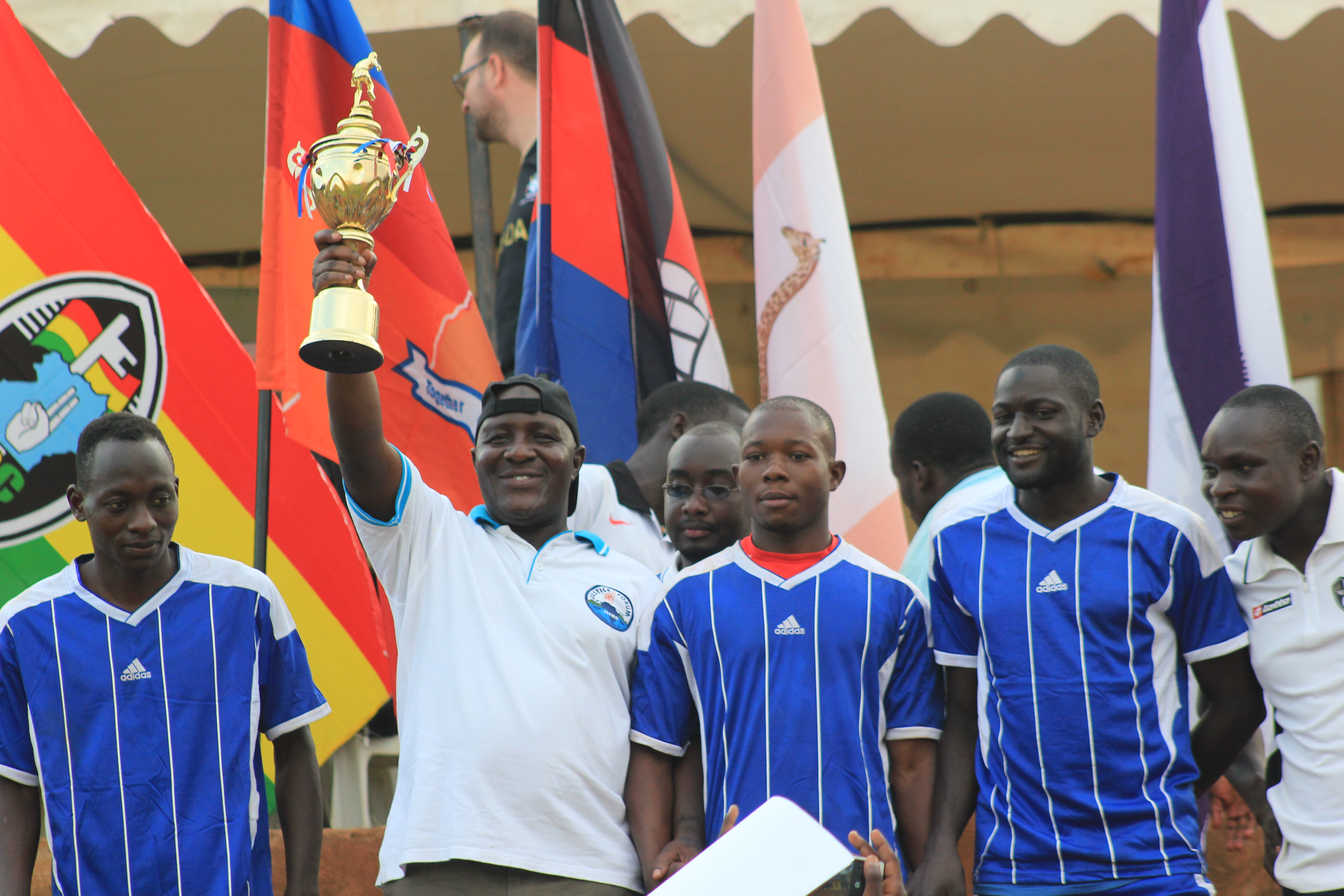  Asuman Basarirwa president of JEEMA holding the trophy