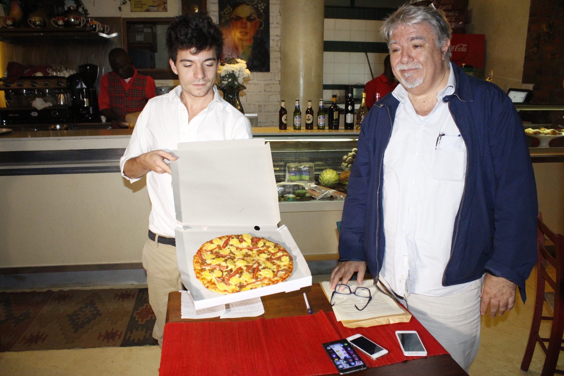 Leonardo Giannetti (Son of Proprietor- Pizza Connection) with Stefano Giannetti (Proprietor- Pizza Connection) unveiling the new Pizza Matooke