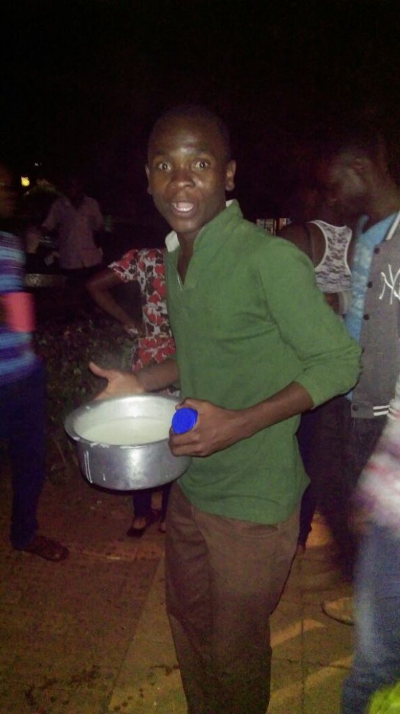 One of the students seen carrying a whole saucepan full of porridge
