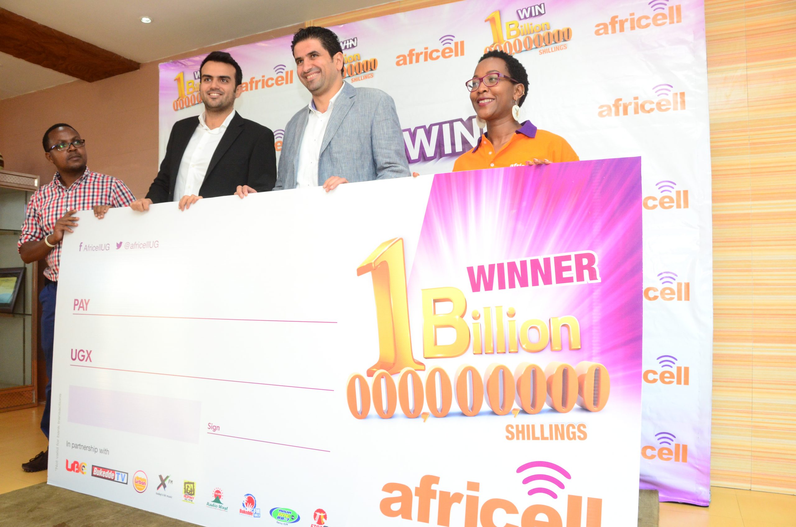 Steven Baryevuga corporate communications milad khairallah commercial director mohammad ghaddar chief operations-officer-nelly-nalugwa-media-coordinator at the launch of Africell one billion