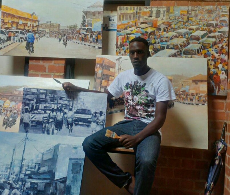 Francis Ainembabazi with some of his art 