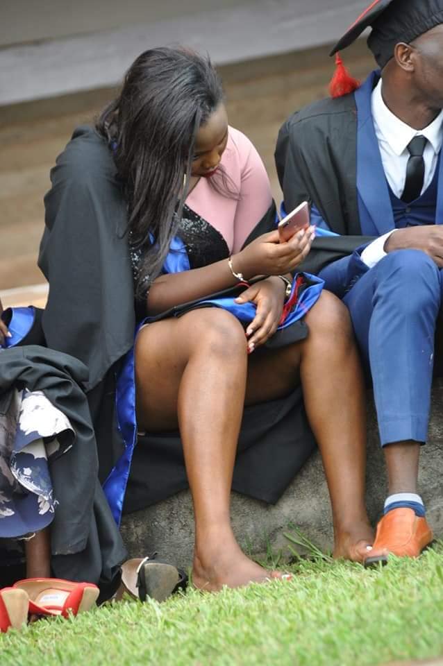 MUKOOWU! Unbothered SLAU Graduate Parades Juicy Thighs And Smooth Road To Sumbie In A Gown, Leaves Fellow Students Debating