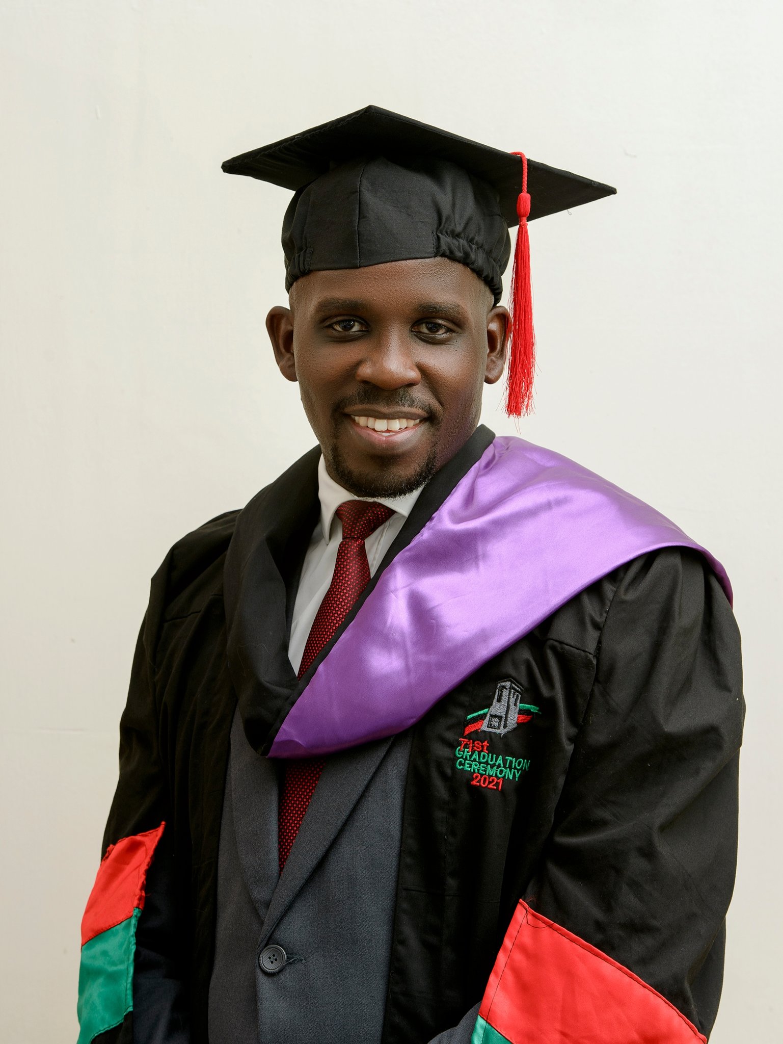 Joel Ssenyonyi shimmering in his graduation gown