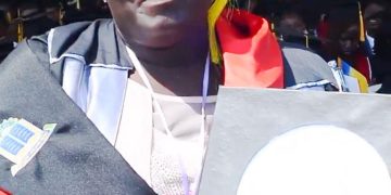 Esther Adibo displays her accolade at the graduation